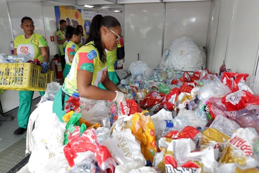 salvador, bahia, brazil - february 11, 2024: worker at a recycling center for waste from carnival in Salvador.

