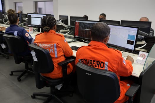 salvador, bahia, brazil - february 12, 2024: Security forces professionals working at the integrated control and command center in the city of Salvador