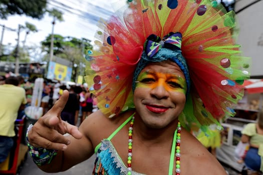 salvador, bahia, brazil - february 10, 2024: members of the As Muquiranas block are seen during the caranval in the city of Salvador.
