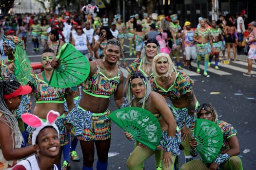 salvador, bahia, brazil - february 10, 2024: members of the As Muquiranas block are seen during the caranval in the city of Salvador.