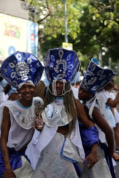 salvador, bahia, brazil - february 10, 2024: members of the Afoxer Filhos do Korin Ofano block seen during the caranval in the city of Salvador.