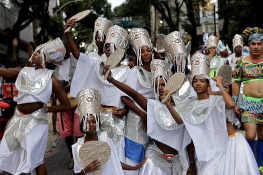 salvador, bahia, brazil - february 10, 2024: members of the Afoxer Filhos do Korin Ofano block seen during the caranval in the city of Salvador.