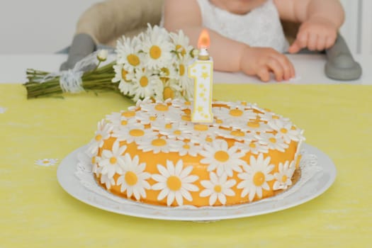 Yellow cake with daisy flowers chamomile for birthday