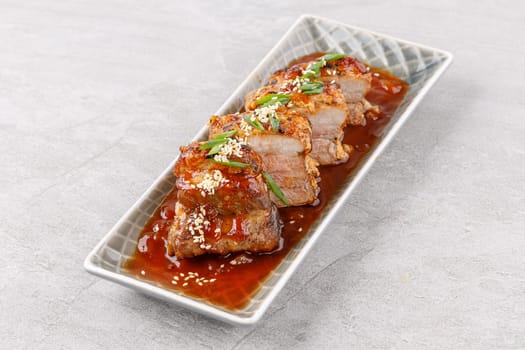 roasted appetizing pork on a stone background studio food photo 4