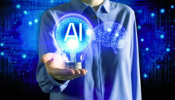 A digital composite image showing a person in a blue shirt holding a clear light bulb. Within the bulb, the letters 'AI' are illuminated, and around it, there are glowing blue circuit board patterns and brain-like structures representing artificial intelligence. The backdrop features abstract digital graphics suggesting data processing and neural networks. The overall aesthetic conveys a theme of innovation, technology, and the concept of AI as a bright idea.