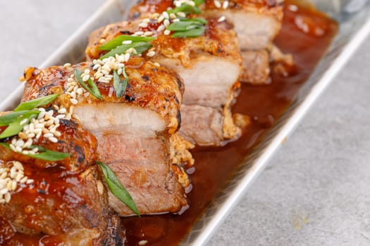 roasted appetizing pork on a stone background studio food photo 8
