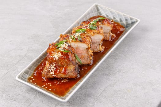 roasted appetizing pork on a stone background studio food photo 13