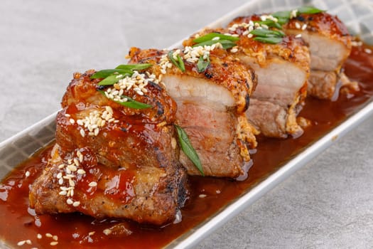 roasted appetizing pork on a stone background studio food photo 12