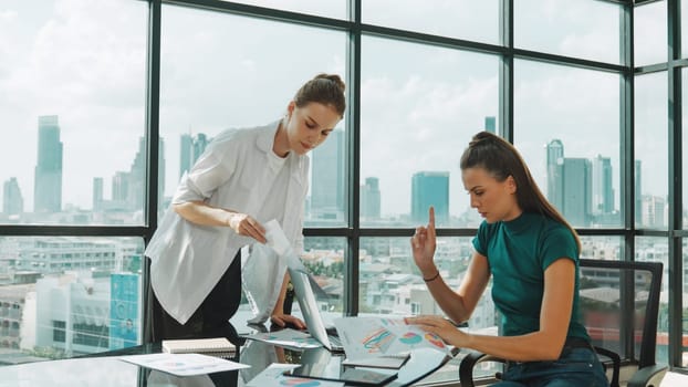 Smart businesswoman present start up project while executive manager listen carefully. Professional business team working together, sharing, discussing, thinking about business idea. Tracery