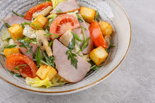 salad with ham and halloumi cheese on a stone background studio food photo 11