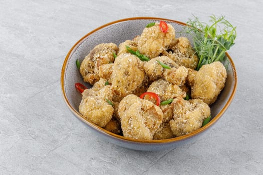 mushrooms in batter on a stone background studio food photo 5