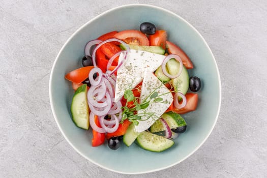 Greek salad on a stone background studio food photo 4