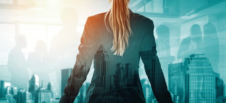 Double Exposure Image of Business Person on modern city background. Future business and communication technology concept. Surreal futuristic cityscape and abstract multiple exposure interface. uds