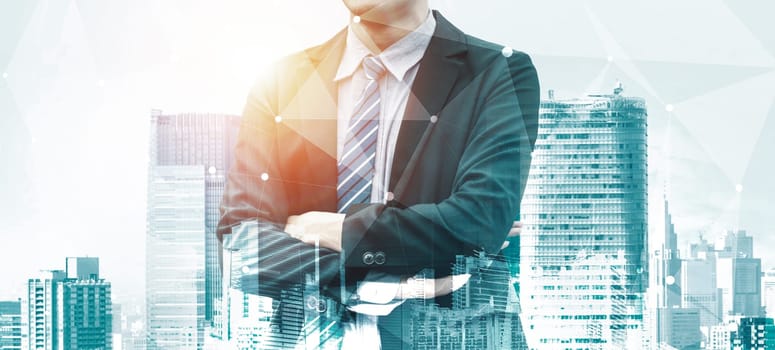 Double Exposure Image of Business Person on modern city background. Future business and communication technology concept. Surreal futuristic cityscape and abstract multiple exposure interface. uds