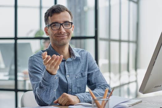 Smiling Male Extending Hand For Handshake At Camera, Offering Partnership