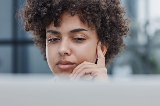 Portrait of Young Successful Caucasian Businesswoman Sitting at Desk Working