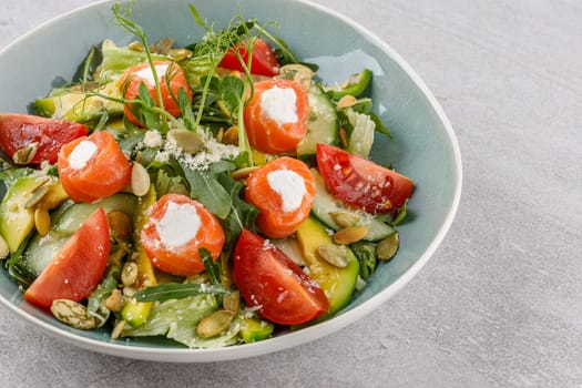 salad with salmon and cream cheese on a stone background studio food photo 4