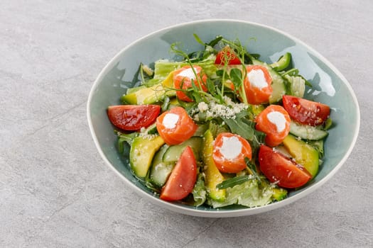 salad with salmon and cream cheese on a stone background studio food photo 1
