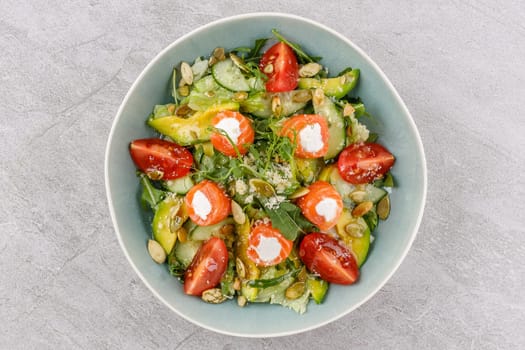 salad with salmon and cream cheese on a stone background studio food photo 7