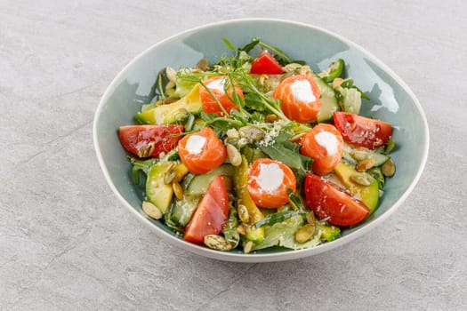 salad with salmon and cream cheese on a stone background studio food photo 6