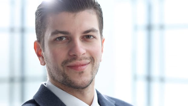 A businessman man working in the office in close-up.