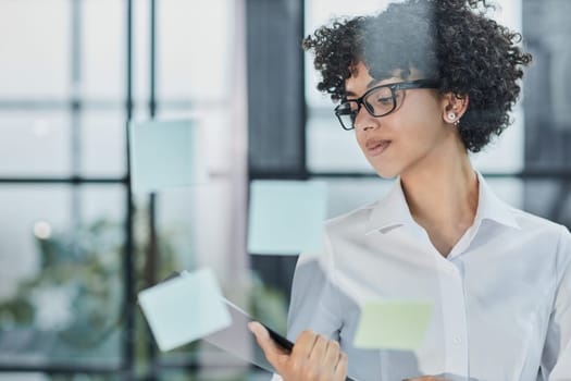 business woman mentor leader write tasks creative ideas on sticky post
