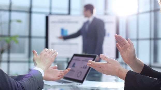 A successful business conference and the applause of colleagues.