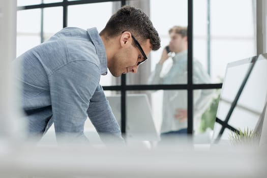 man working making notes in his planner