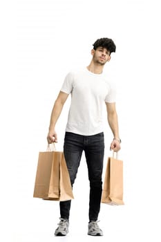 Man, on a white background, full-length, with bags.