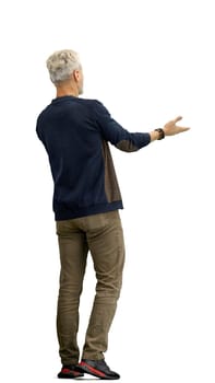 A man, full-length, on a white background, spreads his arms.