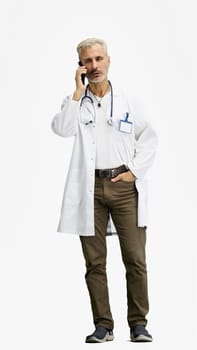 The doctor, in full height, on a white background, talking on the phone.