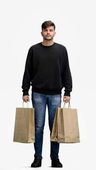 A man, full-length, on a white background, with bags.