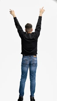 A man, full-length, on a white background, waving his arms.