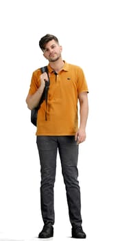 A man, full-length, on a white background, with a backpack.