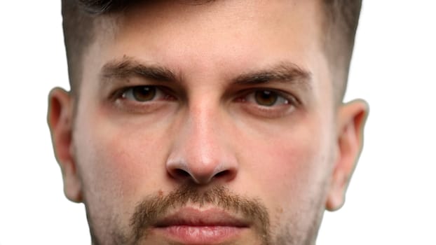 Man's eyes, close-up, on a white background.