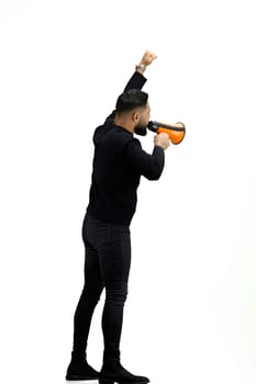 A man, full-length, on a white background, with a megaphone.