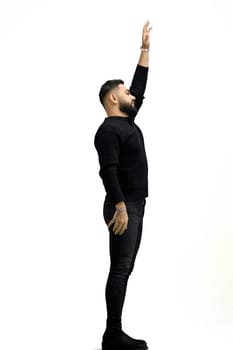 A man, full-length, on a white background, waving his arms.