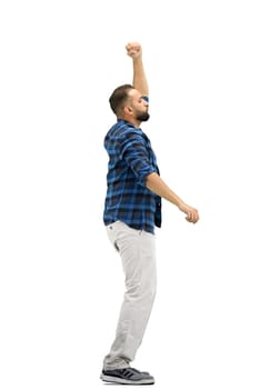 A man, full-length, on a white background, waving his hand.