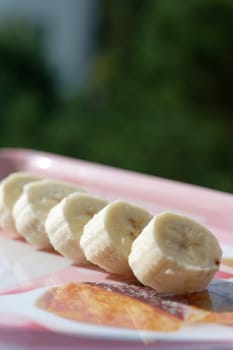 fresh organic banana in a plate on the table