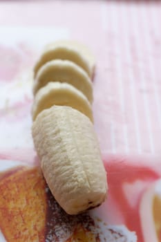 fresh organic banana in a plate on the table