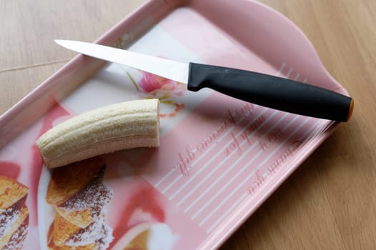 fresh organic banana in a plate on the table