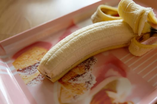 fresh organic banana in a plate on the table