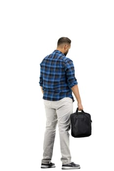A man, full-length, on a white background, with a briefcase.