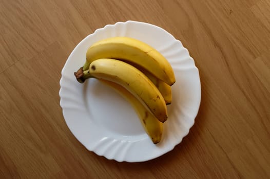 banana on white plate