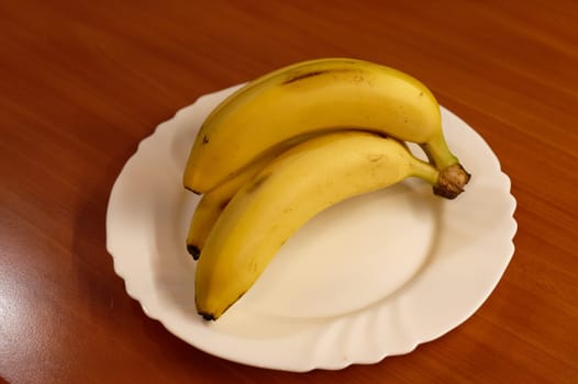 banana on white plate