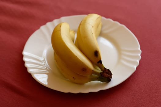 banana on white plate