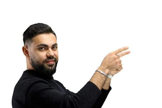 A man, close-up, on a white background, points to the side.