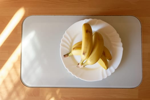 banana on white plate