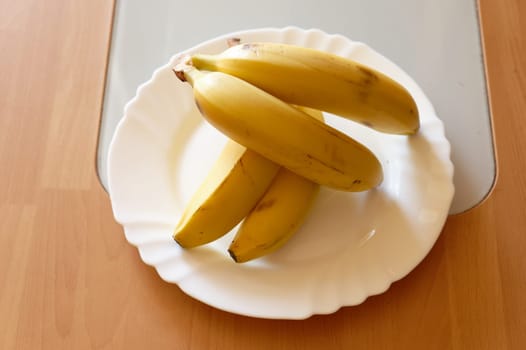 banana on white plate