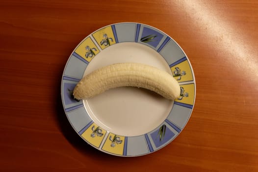 banana on white plate